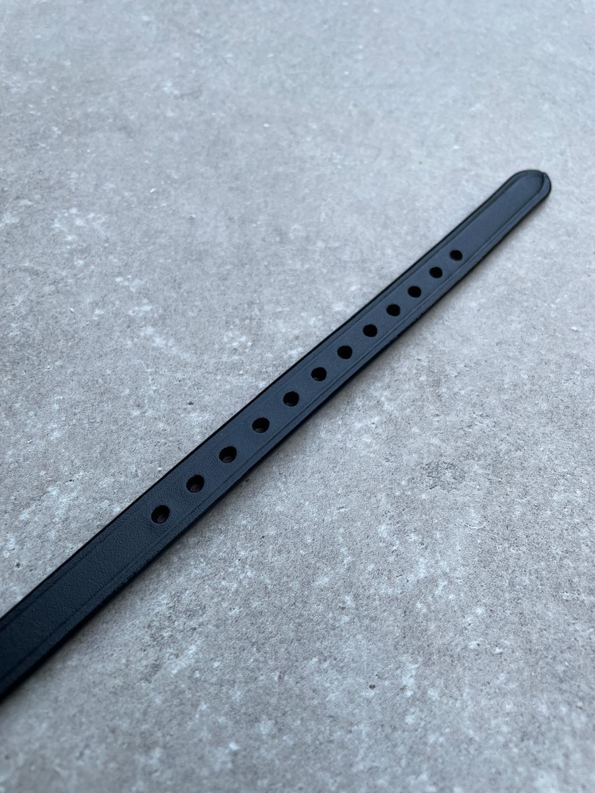 Sperriem zwart, Zilvere gesp