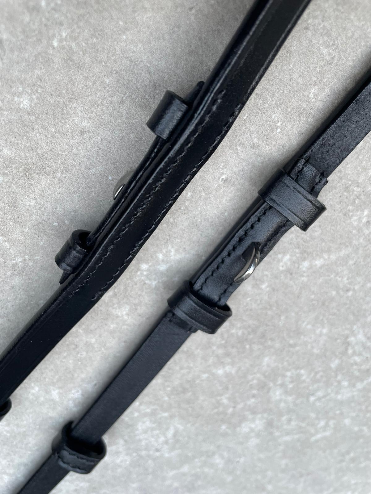 Bakstukken zwart, Zilvere gesp